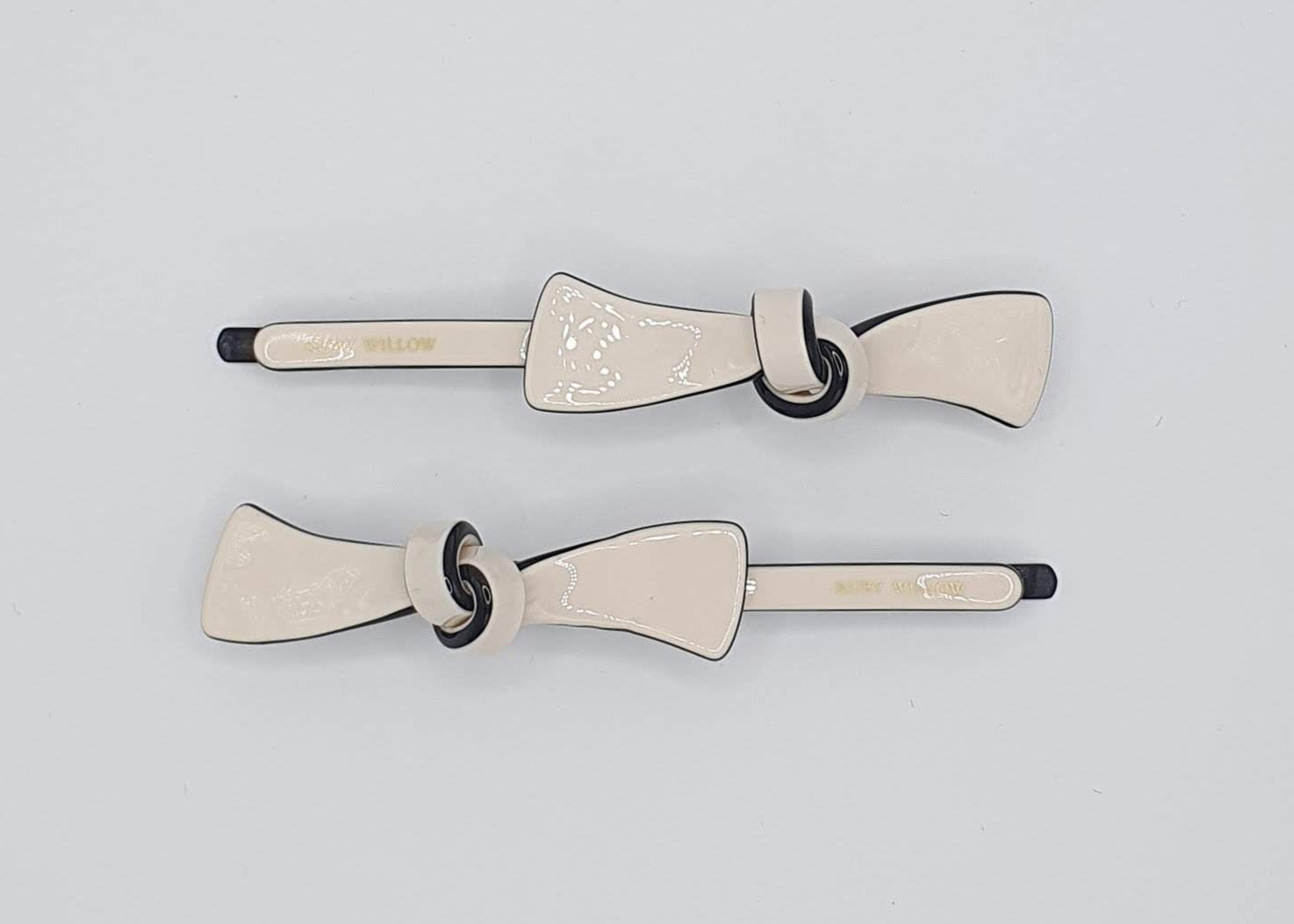 Sarita - Cream Bow Acetate Hair Slides